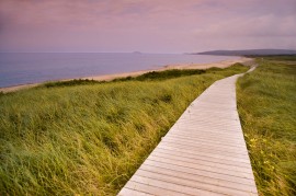 Wooden trail to the ocean shore